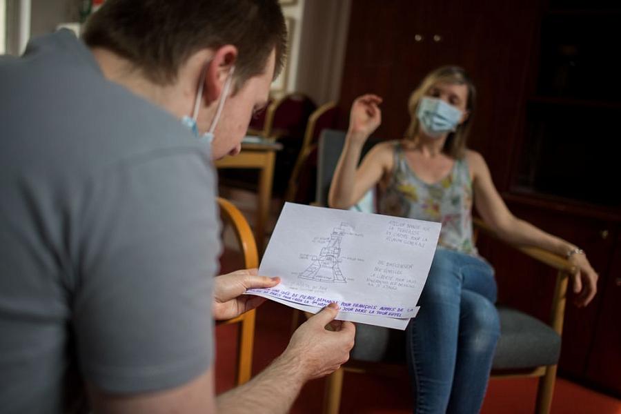 A psychiatrist works with a young patient 