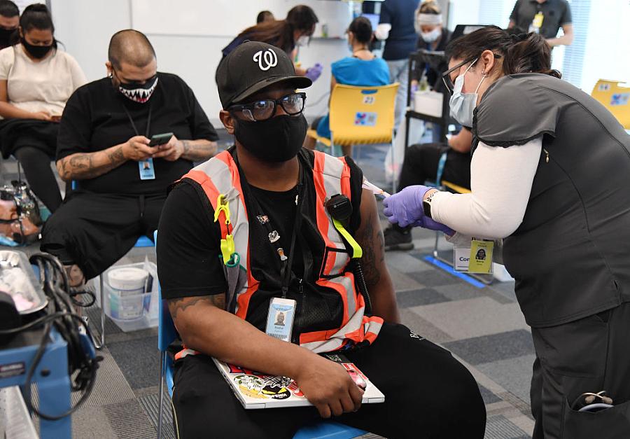 Employees are vaccinated at an Amazon fulfillment center in March in North Las Vegas, Nevada. 