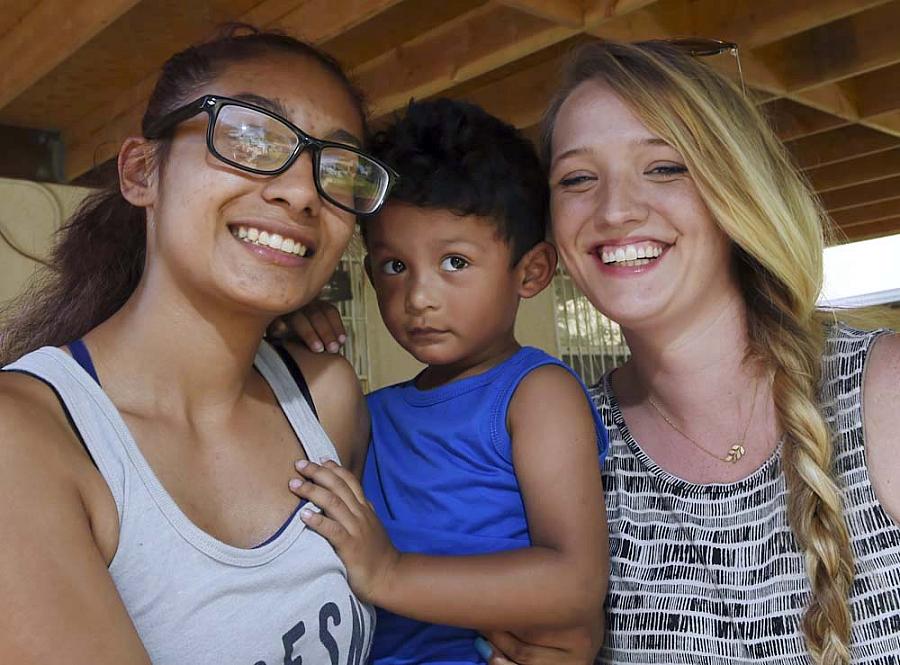 Former Fresno High student Viririana Covarrubias, left, with her son Sebastian and reporter Mackenzie Mays. Covarrubias became p