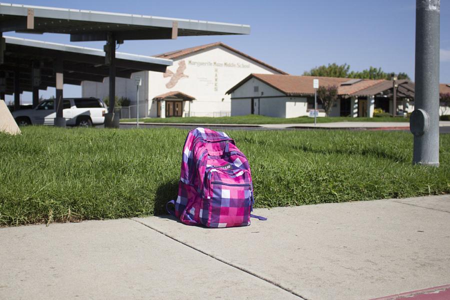 Backpack on sidewalk