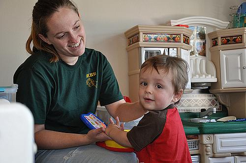 Health caregiver with toddler