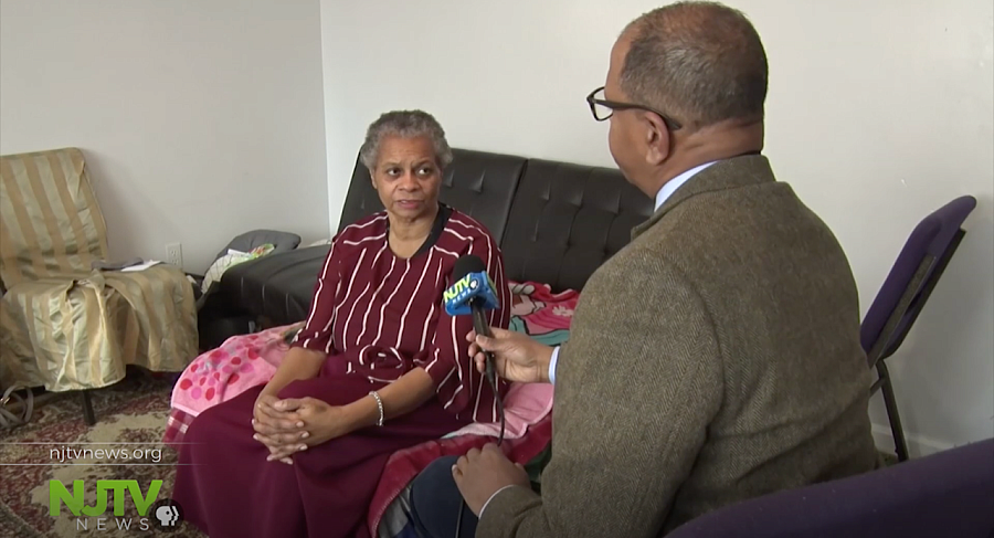 Michael Hill interviews a Newark resident for his series on trauma and its aftermath. Telling the story of trauma’s tragedy and treatment in Newark, New Jersey