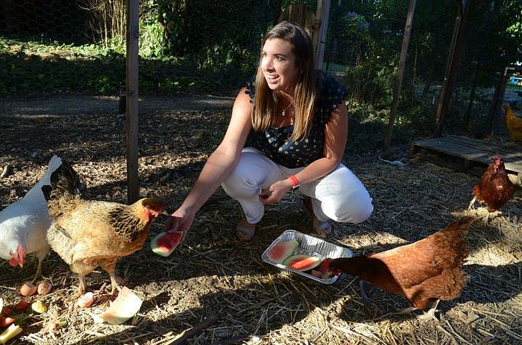 Leslie Mullowney, who was contacted after responding to our call-out. Here she feeds the chickens at the Napa home she and her f