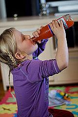 Kid drinking soda