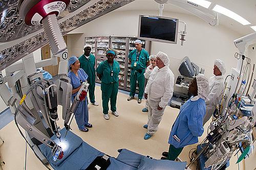 Hospital surgical room with hospital staff.