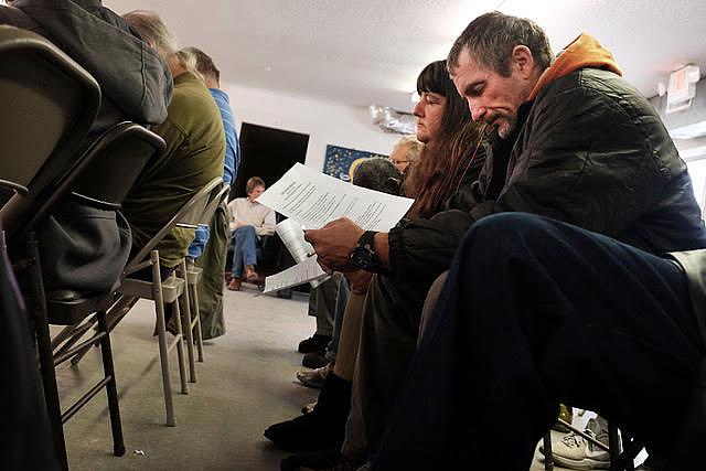 Men and women participate in a church service before a meal for those in need in Biloxi, Mississippi. The state is currently seeking federal approval to add work requirements to its Medicaid program. (Photo by Spencer Platt/Getty Images) (Photo by Spencer Platt/Getty Images)