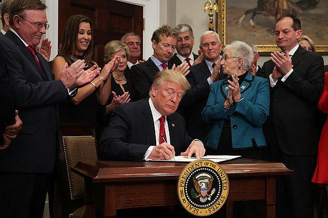 President Trump signed an executive order in October that paved the way for the return of association health plans. (Photo by Alex Wong/Getty Images) Photo by Alex Wong/Getty Images