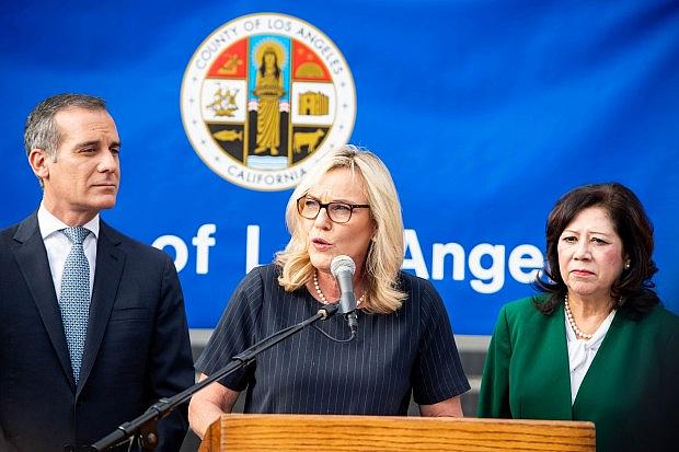 Flanked by Mayor Eric Garcetti and Los Angeles County Supervisor Hilda Solis, Supervisor Kathryn Barger speaks as public health officials and city and county leaders declare a local public health emergency as the number of coronavirus cases increase in Los Angeles County on Wednesday, March 4, 2020. (Photo by Sarah Reingewirtz, Pasadena Star-News/SCNG)