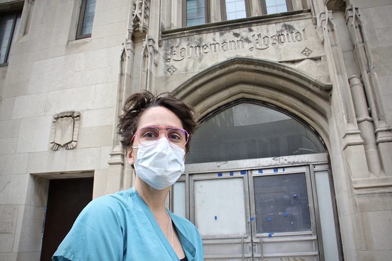 Dr. Shawn Mattson stands outside Hahnemann Hospital on North Broad Street, where she served her residency before the hospital closed in 2019. (Emma Lee/WHYY)