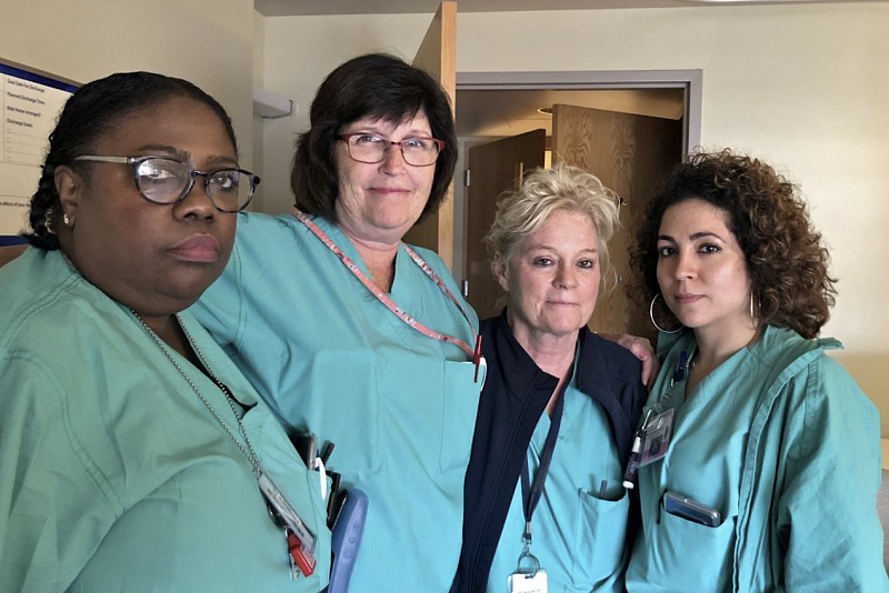 Nurses on the labor and delivery unit at Hahnemann, (from left) Lisa Myers, Claire Byrne, Ann Fitzsimmons, and Sasha Vazquez. (Emily Scott/WHYY)