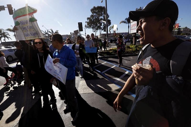 My Nguyen marches in a Little Saigon rally in 2018 against the Trump Administration’s attempt to change and violate the repatriation agreement between the U.S. and Vietnam. That would have put 8,500 Vietnamese Americans at risk of deportation.(Genaro Molina / Los Angeles Times) My Nguyen marches in a Little Saigon rally in 2018 against the Trump Administration’s attempt to change and violate the repatriation agreement between the U.S. and Vietnam. That would have put 8,500 Vietnamese Americans at risk of deportation.(Genaro Molina / Los Angeles Times)