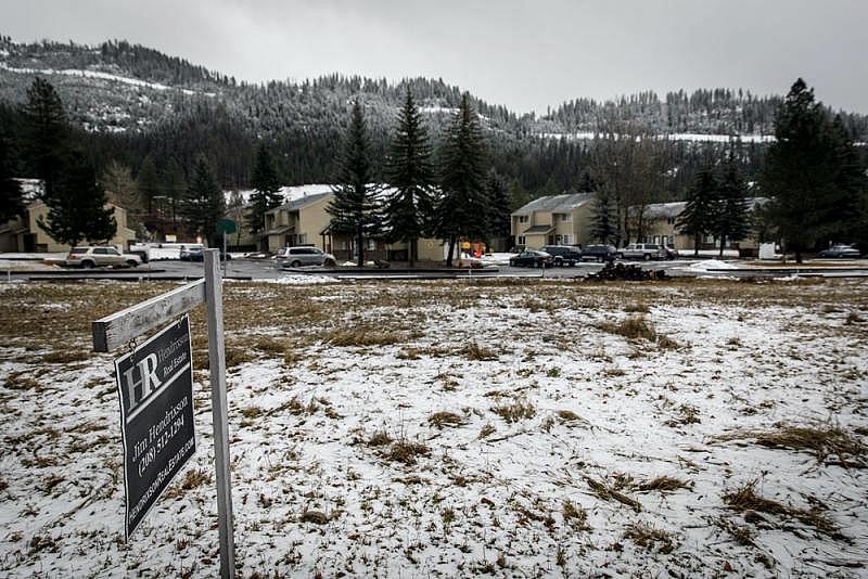 An empty field and a playground at Canyonside Townhouses, seen on Jan. 5, 2021, is the primary area where children of the public housing complex play in Wallace, Idaho. Photo: Rebecca Stumpf for The Intercept