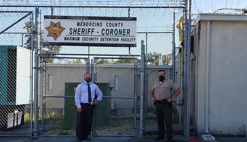 Mendocino County's probation chief (left) and sheriff stand in front of the jail in a photo posted to the sheriff's Facebook page on July 8, 2020. MENDOCINO COUNTY SHERIFF