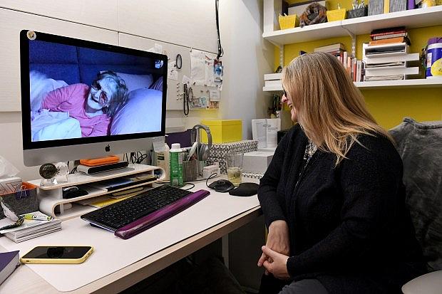 Maitely Weismann, co-founder of the Essential Caregivers Coalition, speaks to her mother, Celia Weismann, who lives in an assisted-living facility in the Playa Vista community of Los Angeles, via video technology from her home in Brentwood on Tuesday, September 29, 2020. (Photo by Axel Koester, Contributing Photographer)