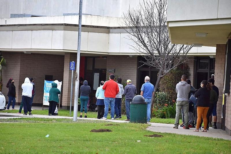 Neighborhood residents line up to receive COVID-19 tests at Franklin School on Santa Barbara’s Lower Eastside as part of the Santa Barbara County Public Health Department’s outreach efforts. (Brooke Holland / Noozhawk photo)