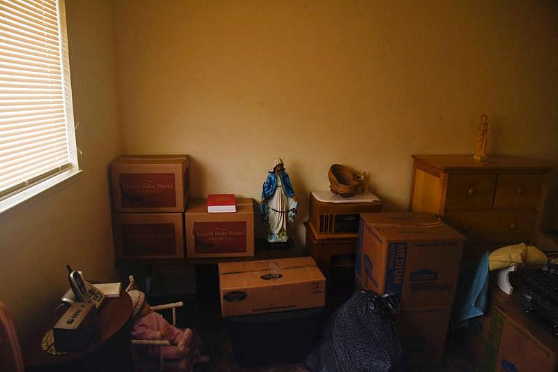 Stacked boxes full of belongings fill the cramped bedroom of Martinez's apartment. Aug. 7, 2020. Ayrtron Ostly/The Californian Stacked boxes full of belongings fill the cramped bedroom of Martinez's apartment. Aug. 7, 2020. Ayrtron Ostly/The Californian