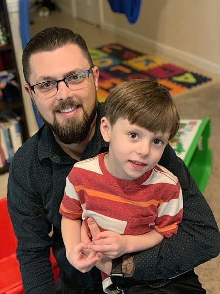 Nick Lutton and his 7-year-old son, Mason, of Fresno. Mason has autism and has struggled to adapt to the loss of in-person schooling and therapy during the pandemic. His behavioral outbursts have put strain on the family. Photo courtesy of the Lutton family.