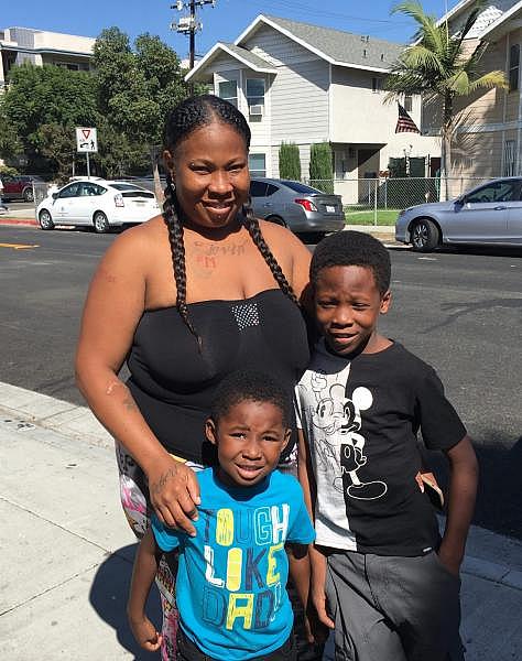 Marceda Harris and her sons Jay’on and Tevin. Harris is enrolled in a home visiting program with SHIELDS for Families. Photo courtesy of Marceda Harris. 