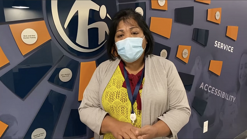Irene Maun Sigrah, a Marshallese health worker at Crescent Community Health Center, records a public service announcement in November 2020 about how to stay safe from Covid-19 during the holidays. | Crescent Community Health Center