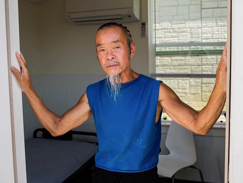 Nguyen, 59, lived with friends and relatives until a recent eviction. He rides his bike from the tiny home community to his job at a nearby Amazon warehouse. (Photo: Pamela Gentile) Nguyen, 59, lived with friends and relatives until a recent eviction. He rides his bike from the tiny home community to his job at a nearby Amazon warehouse. (Photo: Pamela Gentile)