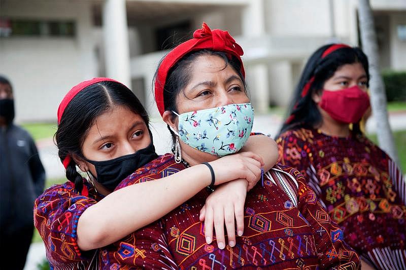 Sindia Vasquez, 13, Juana Lopez and Flor Perez, 14, all of Lake Worth attend the Public Prayer to Honor Farmworkers Lost Due to COVID-19 event at the Saturday March 27, 2021 at the Palm Beach County Health Department in West Palm Beach. Meghan McCarthy, MEGHAN McCARTHY/Palm Beach Daily News