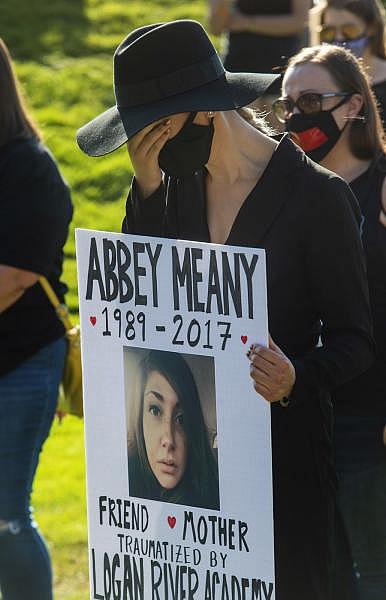 (Rick Egan | The Salt Lake Tribune) Cassandra Hardin, breaks down during a moment of silence at a rally calling for the closure of Provo Canyon School, a residential treatment center in Utah she attended when she was a teen, on Friday, Oct. 9, 2020