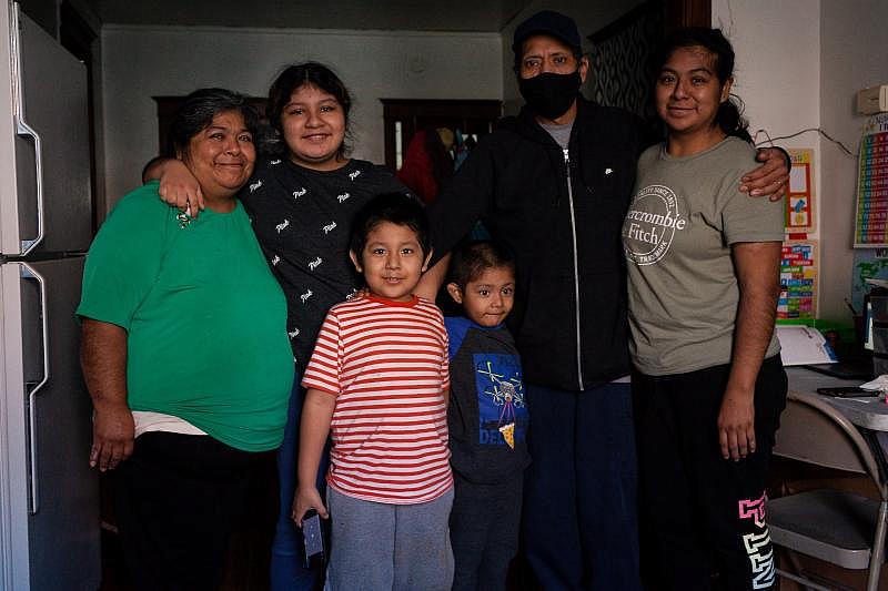 From left: Candelaria Lucero, daughter Isamari Lucero, grandsons Noah Ayala and Isaac Ayala, son-in-law Enrique Ayala, and daughter Sarai Camarillo. Michelle Kanaar / WBEZ From left: Candelaria Lucero, daughter Isamari Lucero, grandsons Noah Ayala and Isaac Ayala, son-in-law Enrique Ayala, and daughter Sarai Camarillo. Michelle Kanaar / WBEZ