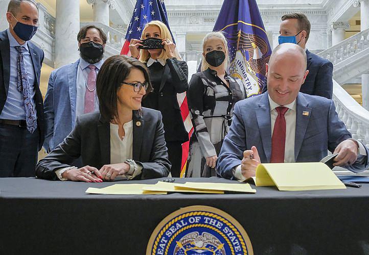 (Leah Hogsten | The Salt Lake Tribune) Utah Gov. Spencer Cox, right and Lt. Gov. Deidre Henderson, left, were joined by activists and supporters of SB127 in the Capitol rotunda, April 6, 2021 for the ceremonial bill signing that will bring more oversight to the state’s so-called troubled-teen industry. In back l-r Sen. Mike McKell, R-Spanish Fork, activist Jeff Netto, activist Paris Hilton, activist Caroline Lorson and Rep. Brady Brammer, R-Highland. (Leah Hogsten | The Salt Lake Tribune) Utah Gov. Spencer Cox, right and Lt. Gov. Deidre Henderson, left, were joined by activists and supporters of SB127 in the Capitol rotunda, April 6, 2021 for the ceremonial bill signing that will bring more oversight to the state’s so-called troubled-teen industry. In back l-r Sen. Mike McKell, R-Spanish Fork, activist Jeff Netto, activist Paris Hilton, activist Caroline Lorson and Rep. Brady Brammer, R-Highland.