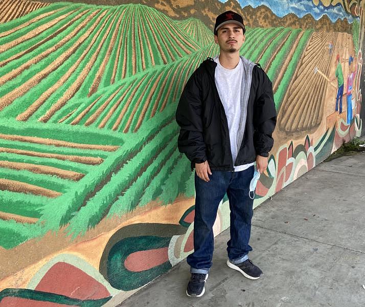 Daniel Leon outside of Westside Liquors before the start of his shift. Photo by Noe Magaña.