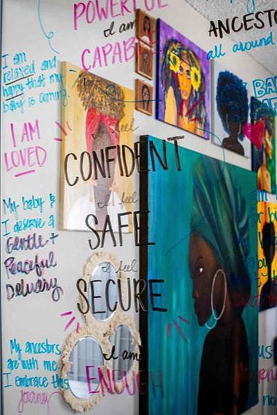 Lindsay Stokes Kennedy wrote her wife MyLin’s birth affirmations on a mirror where Mylin’s paintings are reflected as seen on Thursday, September 16, 2021. (Photo by Sarah Reingewirtz, Los Angeles Daily News/SCNG)