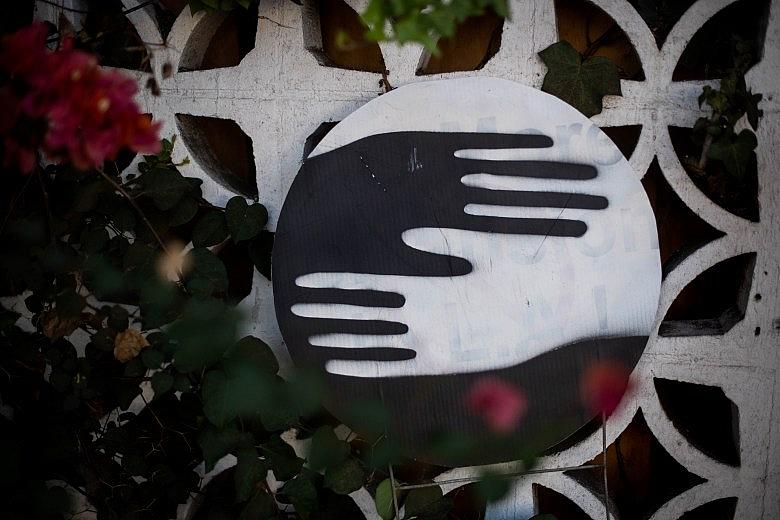 A painted yard sign sits outside a building on La Cienega Boulevard in Los Angeles which was once Midwife Racha Tahani Lawler’s dream, a birth center for the black community. (Photo by Sarah Reingewirtz, Los Angeles Daily News/SCNG)