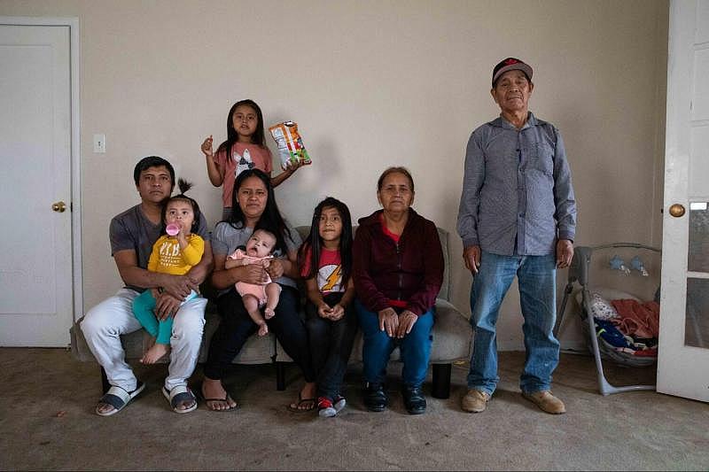 A family photo of Silvia Garcia’s four children, husband and parents. Photo by Zaydee Sanchez for palabra