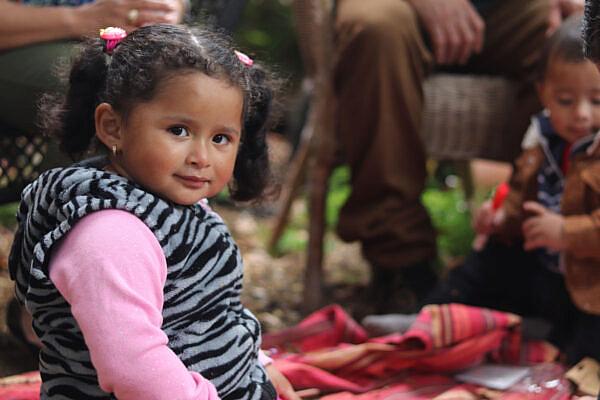 Two-year-old Deborah Arleth plays with her baby brother, Joshua Emanuel. Photo: Alexis Terrazas