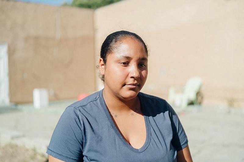 Kamisha Nafarrete said she briefly lived in a hotel before moving into this unpermitted apartment building. (AL KAMALIZAD/LAIST)