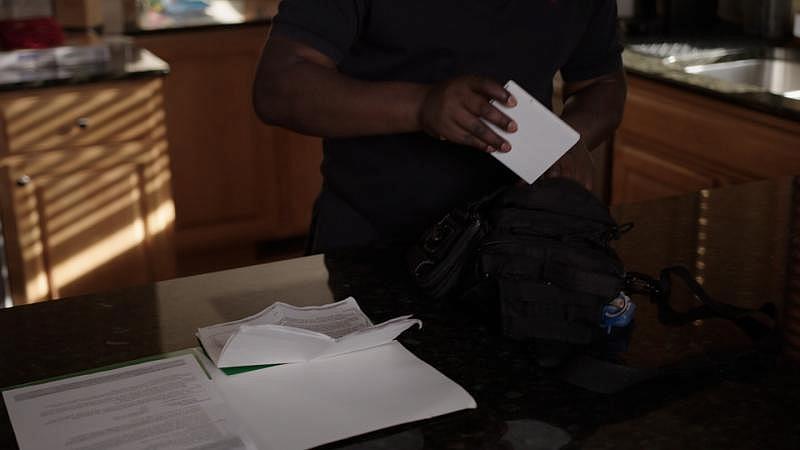 Jacob Dean / Jacob Dean Paul Gakpo keeps hard copies of his treatment protocol signed by his hematologist. He says it helps ensure he is believed if ever goes into a pain crisis and ends up at the Emergency Department.