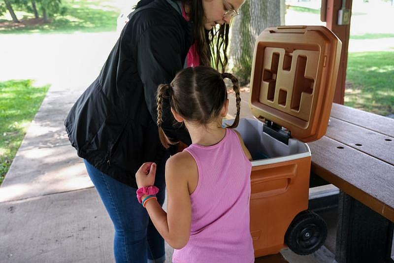 Erin McAlvany's family receives meals at a meal site in Kirksville, Mo. Arin Yoon for NBC News