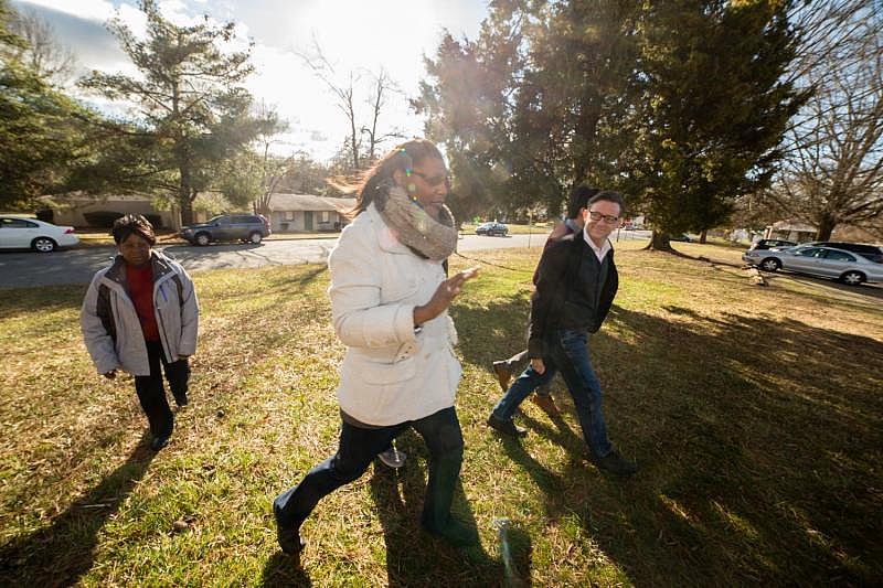 In 2017, community activist Sandra Williams, from left, Josie Williams of the Greensboro Housing Coalition, and then Center for Housing and Community Studies at the University North Carolina-Greensboro Director Stephen Sills examined asthma hot spots in Greensboro, North Carolina. Josie Williams is now executive director of the Greensboro Housing Coalition. PHOTO COURTESY UNIVERSITY OF NORTH CAROLINA-GREENSBORO