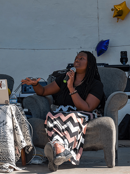 Dr. Sayida Peprah-Wilson speaks to the crowd about mental health and wellness during a “My Hair, My Health” event in Riverside, CA on August 28, 2022 (Aryana Noroozi for Black Voice News/CatchLight Local)..