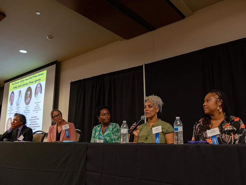 Chantel Runnels speaks on a panel at the Inland Empire Perinatal Equity Provider and Community Summit at Cal Baptist University in Riverside, CA. (Aryana Noroozi for Black Voice News/CatchLight Local). September 16, 2022.