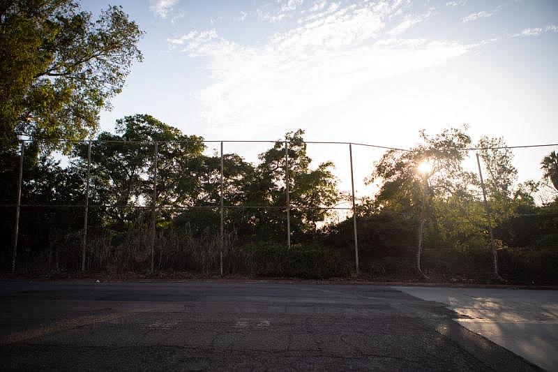 A fence near the Fashion Valley trolley station, where Anastasia met her son after he had been missing, is shown on Aug. 24, 2022. Her son ran away from the station through a nearby fence before a PERT team arrived. (Zoë Meyers/inewsource)