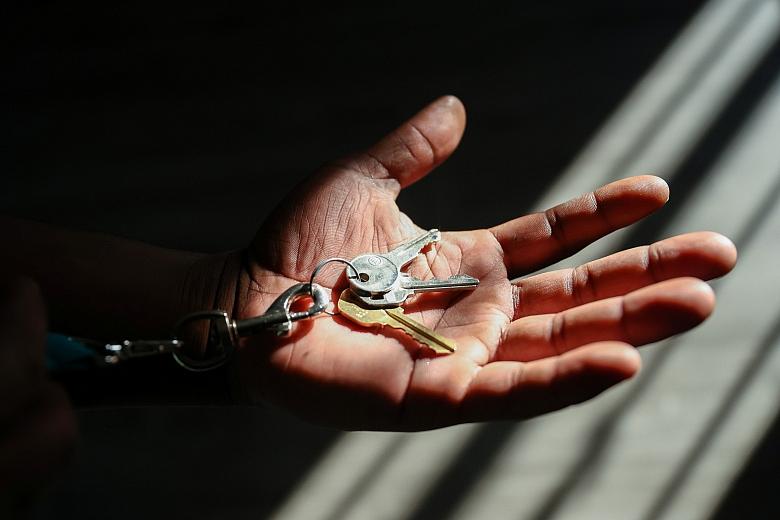 Henderson holds the keys to his new apartment in San Jose on Thursday, July 22, 2022. (Shae Hammond/Bay Area News Group)