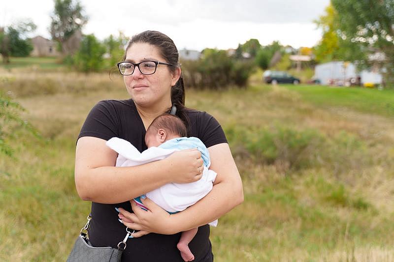 Cassandra Big Crow, 29, has always wanted to be a mother, to “feel like I have purpose.” She applied for Medicaid when she became pregnant, but state officials denied her request because of her income as an independent contractor. Even among pregnant people, the state has the strictest income limits in the U.S. for Medicaid. Applicants have to make no more than 138 percent above the federal poverty line, which is less than $18,000. Photo by Hope Schumacker for the PBS NewsHour