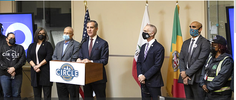 In November 2021, Los Angeles mayor Eric Garcetti (at podium), Urban Alchemy CEO Lena Miller (far left), and others unveil a UA-led program to send an unarmed outreach team instead of police to handle some non-emergency 911 calls. In November 2021, Los Angeles mayor Eric Garcetti (at podium), Urban Alchemy CEO Lena Miller (far left), and others unveil a UA-led program to send an unarmed outreach team instead of police to handle some non-emergency 911 calls.