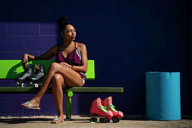 Asa Garcia sits outside Funcity Sk8 in Webster in February. Asa often brought her brother, Fred Harris, here on date nights so the two could skate. It was the last thing the siblings did together before his death in October 2021.  Mark Mulligan, Houston Chronicle / Staff photographer