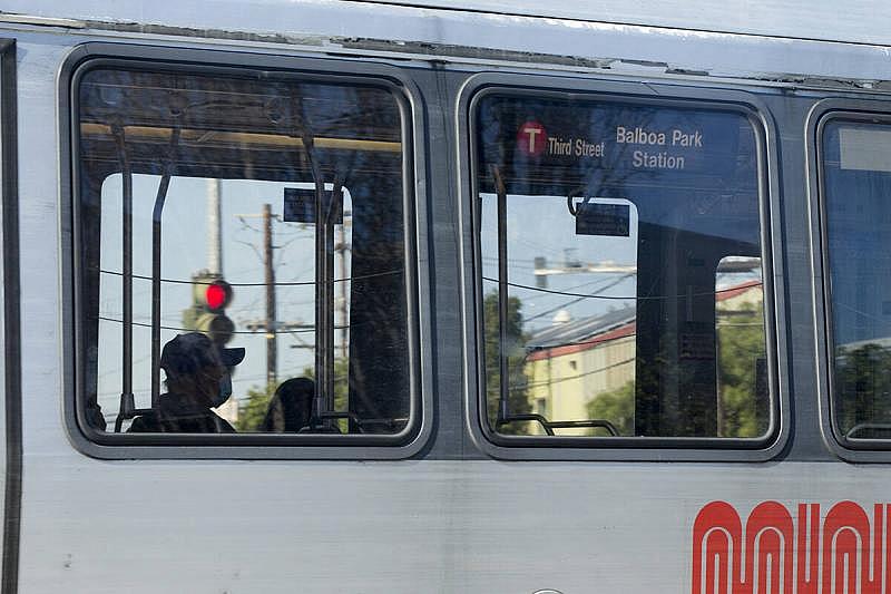 Passengers aboard a T-Third Street Muni train bound for downtown. (Kevin N. Hume/The Examiner)