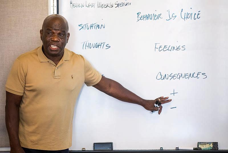 Richard Byes, a YWCA facilitator, leads a class for men who have been court-appointed to participate in a 20-week Transform class for domestic violence offenders on Aug. 26, 2021. LIZ DUFOUR/THE ENQUIRER