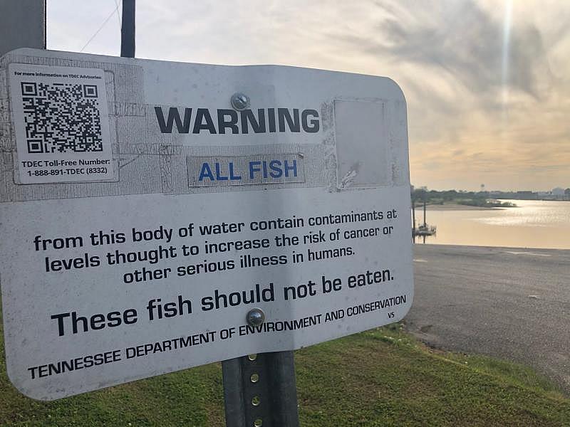 A sign at Martin Luther King, Jr. Riverside Park Marina at Lake McKellar in Memphis warns against consuming fish contaminated with carcinogens. Sarah Macaraeg/Commercial Appeal