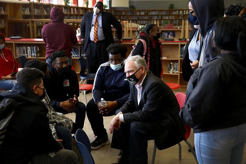 Sen. Tim Kaine talks with students of George Wythe High School informally after their government class meeting in Richmond, Va., on Wednesday, Feb. 23, 2022.  Daniel Sangjib Min/TIMES-DISPATCH