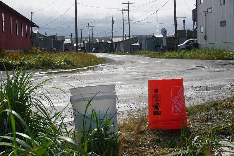 So-called "honey buckets" are the norm for human waste disposal in Teller. The city provides a pick-up service for a monthly fee of $35. (Yereth Rosen)