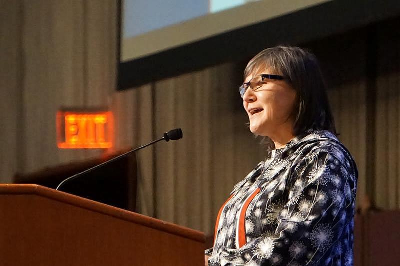 Valerie Davidson gives a keynote address at the 2018 Alaska Federation of Natives convention in Anchorage. Davidson, now president of the Alaska Native Tribal Health Consortium, testified before Congress earlier this year about the need for water and sanitation infrastructure in rural Alaska. (Yereth Rosen)